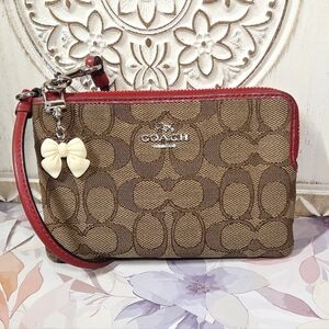 Coach Signature Canvas Wristlet in Brown with Red Trim
